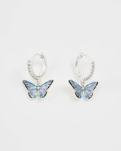 Load image into Gallery viewer, Blue Butterfly Silver Huggie Earrings by Fable England