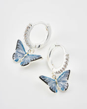 Load image into Gallery viewer, Blue Butterfly Silver Huggie Earrings by Fable England